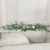 This casket lid garland is an elegant and understated tribute designed to