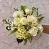 White and pale yellow bouquet with roses, hydrangea, and chrysanthemum