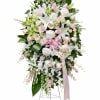 An all white tribute, this funeral spray is pure and tranquil. Variety