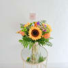  Hermoso arreglo de girasoles y rosas, ideal para sorprender a una