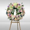 Recipe: Mix of roses, lisianthus, carnations, fuji mums, delphinium on a circle