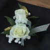 Complete your prom look with our elegant White Spray Rose Boutonniere, handcrafted