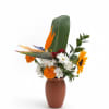 Sunrise Paradise is a vibrant, tropical-inspired arrangement featuring Bird of Paradise, sunflowers