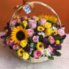 Celebrate the beauty of the season with this vibrant floral basket, thoughtfully
