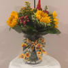 Celebrate a proud milestone with our Sunflower Graduation Celebration Arrangement, a vibrant