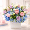 Blush &amp; Blue Garden Elegance

Soft, romantic, and effortlessly elegant, this lush arrangement