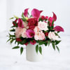 Raspberry Rouge is a bold floral arrangement designed with rich color, soft