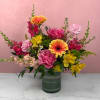 A bold and lively arrangement filled with bright, colorful blooms that feel