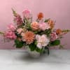 A full, abundant mix of soft, pastel blooms designed to make a