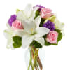 Abound with white lilies, pink roses and purple carnations our Perfect in
