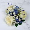 Cream-white roses gathered into a compact corsage give this Sapphire 3 Rose