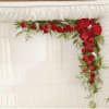 This arrangement is a red rose casket lid corner insert, meant to