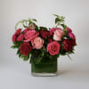 Designed for romance, this elegant arrangement showcases a lush blend of premium