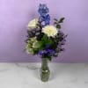 Unforgettable Love is an upright, airy flower arrangement of blue and ivory
