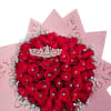 Bouquet of red roses with baby’s breath and a jeweled tiara topper
