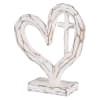 Resin tabletop decor features a heart with a cross inside. Height of