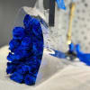 A stunning bouquet of blue roses, designed to stand out with its