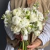 This white bridal bouquet is a refined and luxurious choice for weddings