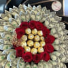 Bouquet of red roses with dollar bills and gold-wrapped chocolates