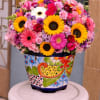  This floral arrangement, in this beautiful handcrafted ceramic vase, is a