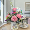 Fluttering Garden Bouquet is a fresh, garden-inspired floral arrangement designed in a