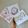 Handmade Mother's Day cards with floral and bee illustrations