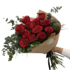 12 Red roses and eucalyptus wrapped in red and brown paper as