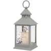 Gray memorial lantern with a candle and 