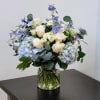 Bring a sense of calm and elegance with this serene arrangement of