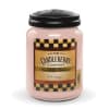A large candle with sweet rosie sugar scent