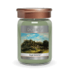 Green jar candle with copper-tone lid and a landscape label reading Sage Serenity.