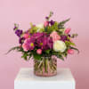 These beautiful blooms of roses, daisy pomps, carnations and filler are in