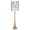 Tall floor lamp with a blue floral shade and gold base