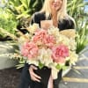 A floral box designed with a soft blend of French roses and