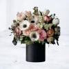 Celebrate any special occasion with Maribelis, a stunning floral arrangement that radiates