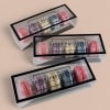 Gift box containing 5 Macarons: Birthday Cake, Blueberry Cheesecake, Champagne, Lavender, &amp;
