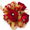 Saturated red roses form a compact, wearable cluster in this red rose
