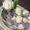 Mini White Roses with a touch of lavander shimmer ribbon corsage and