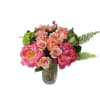 Coral peonies, peach roses, peach spray roses, green hydrangea and fern designed