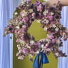 This beautiful wreath is fully dried and artfully crafted in store by