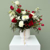 A stunning and elegant arrangement that beautifully captures the essence of timeless