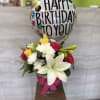 (ALL-ROUND) This beautiful arrangement from Xpressions Florist is a perfect way to