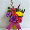 Bright, joyful &amp; full of personality, this arrangement brings a burst of