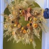 This beautiful wreath is fully dried and artfully crafted in store by
