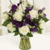 This arrangement is designed with a beautiful mix of flowers in shades