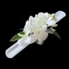 White dendrobium orchid corsage on snap on bracelet