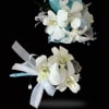A matching set of white dendrobium orchid corsage and boutonniere featuring teal