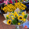 Our tulip and sunflower special. Brighten someone's day with this deluxe yellow