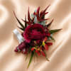 A custom-designed wrist corsage created to complement your chosen color palette. Whether