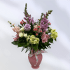 Soft, romantic, garden-style blooms in pinks, lavenders, and white this tall showy